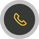 Yellow phone handset icon on dark circular background.