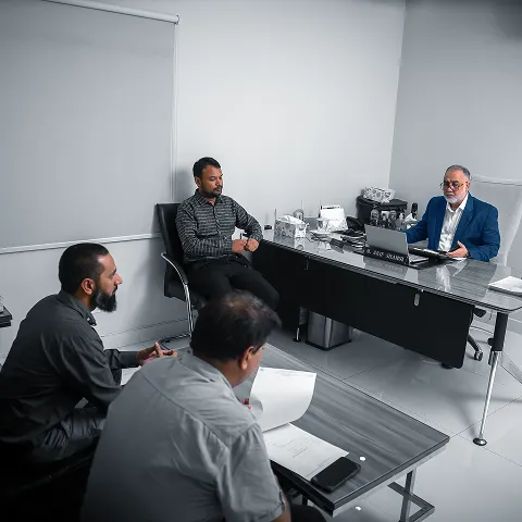 A Owner of MAS meeting with his team.