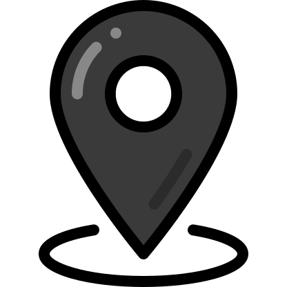 Black location pin icon with a circular hole in the center on a black background.