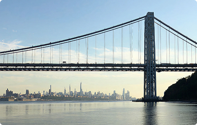 George Washington Bridge over the Hudson River with the New York City skyline viewed from New Jersey.