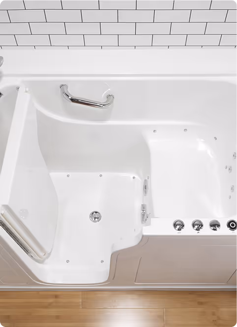 Walk-in bathtub with built-in safety grab bars and low step entry for accessible bathing