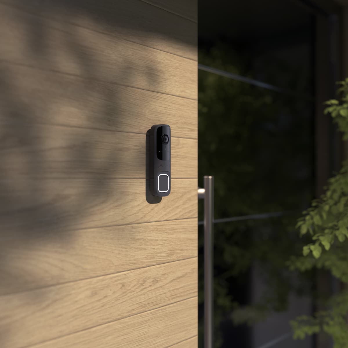 Professional Ajax video doorbell installed on a residential home exterior, providing professionally monitored home security with real-time visual verification