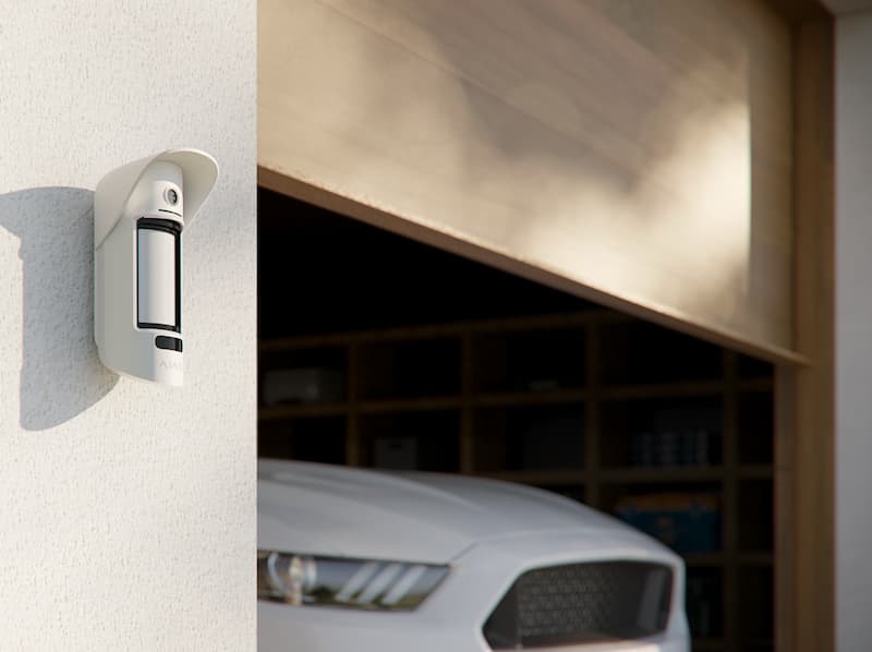 Ajax intrusion sensor protecting a residential garage and entry point with professionally monitored home security