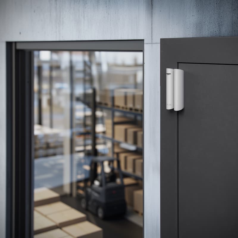 Ajax door and window sensor installed on entry point for intrusion detection and security alerts