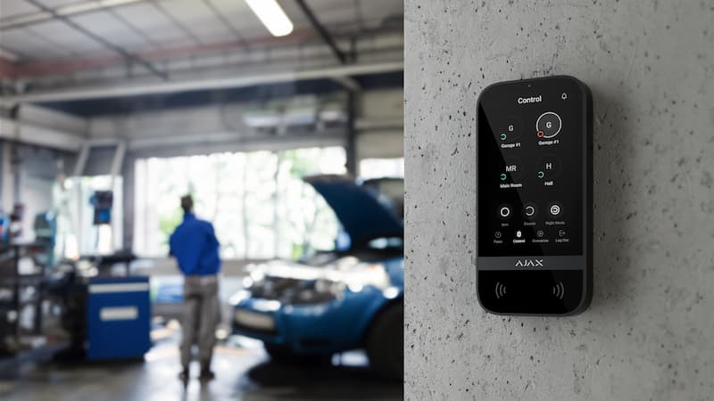 Ajax security keypad installed on wall for system control and secure access management