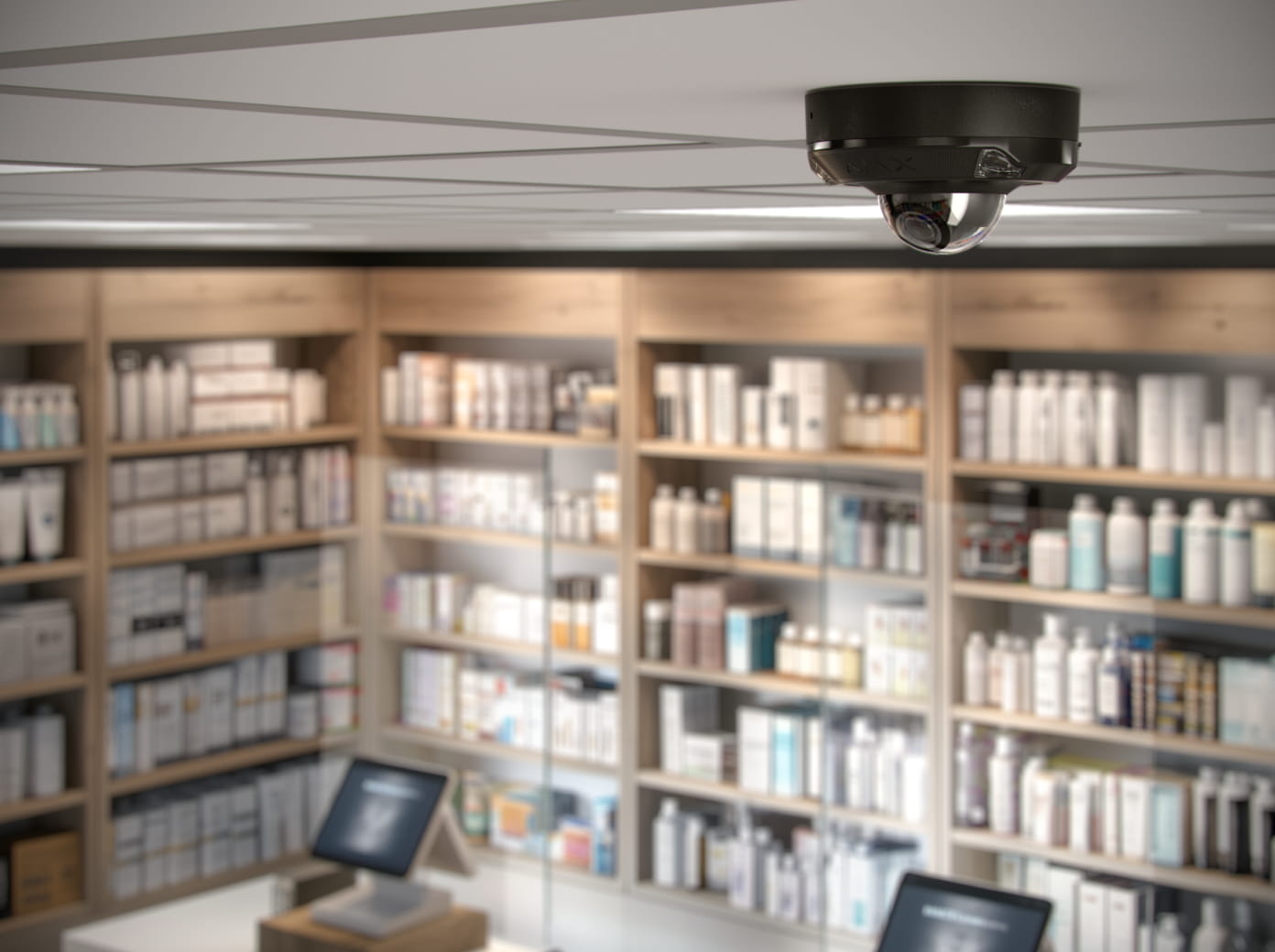 Pharmacy security system with video surveillance protecting prescription areas, pickup counters, and high-value inventory