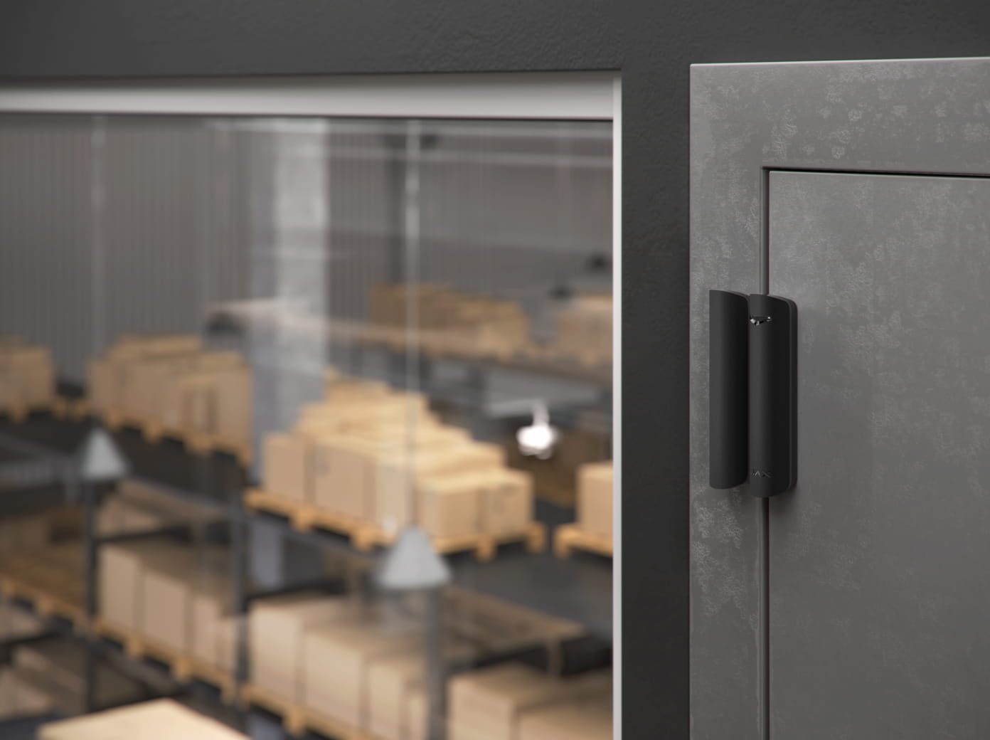 Ajax door opening detector installed on a warehouse entrance with inventory storage in the background