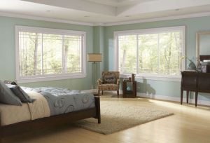 A bedroom with 3-lite windows