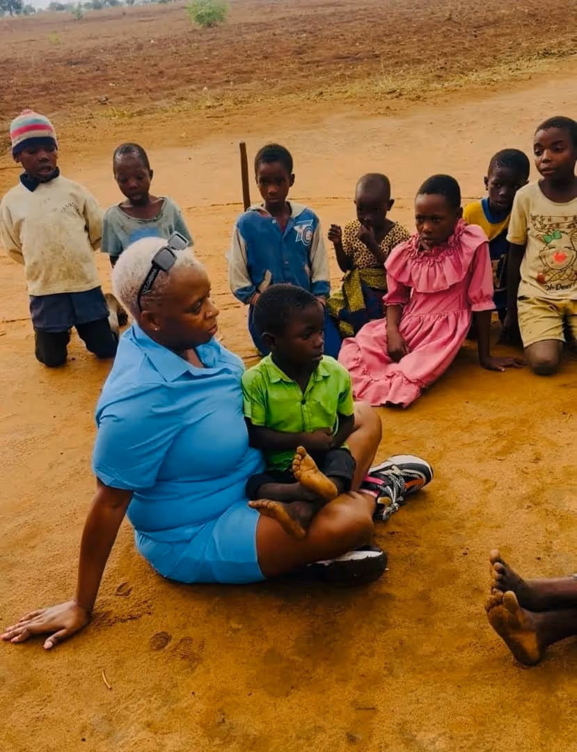 Madalitso Chazima and Sam at Sam's village in Malawi