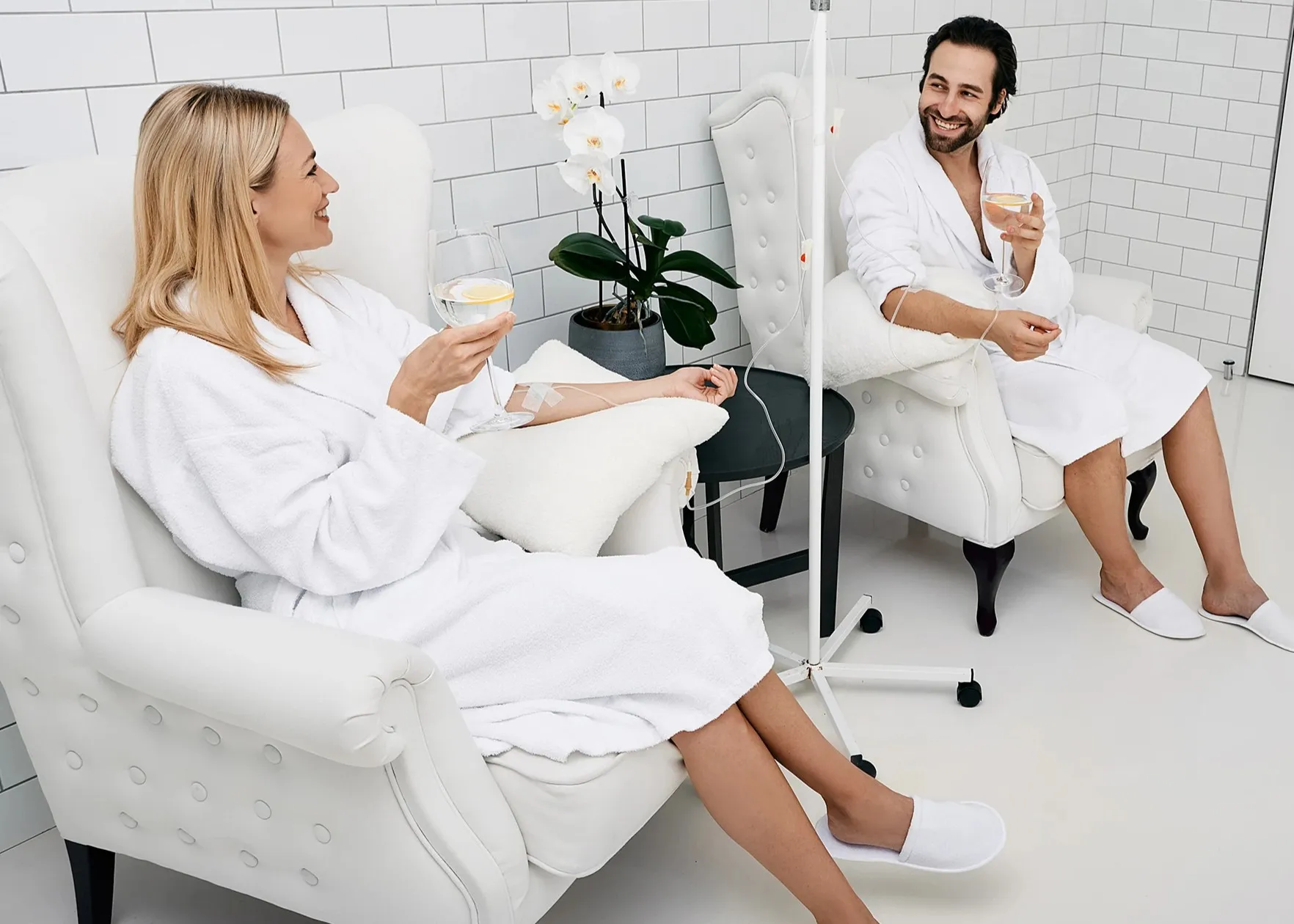 A couple getting Vitamin IV Hydration