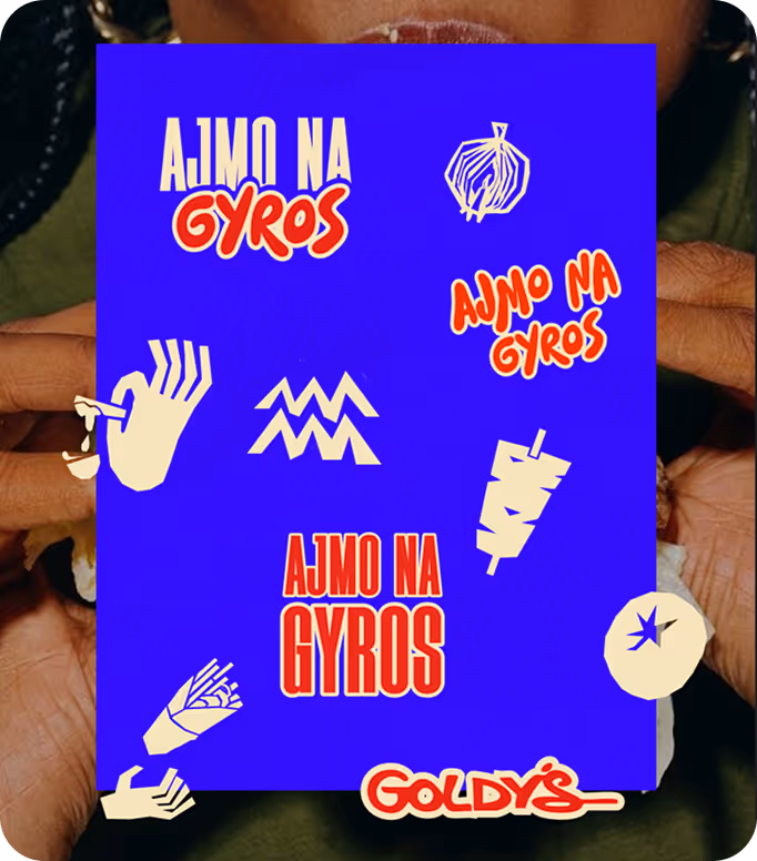 Open menu with a green page listing vitamin juices and prices in Serbian, next to a cartoon black fox wearing red boots holding a glass, on a wooden table with a person's hand nearby.