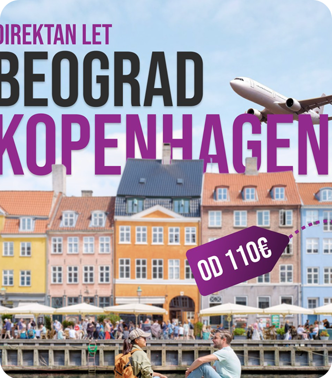 Open menu with a green page listing vitamin juices and prices in Serbian, next to a cartoon black fox wearing red boots holding a glass, on a wooden table with a person's hand nearby.