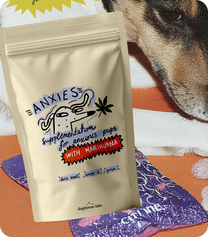 Open menu with a green page listing vitamin juices and prices in Serbian, next to a cartoon black fox wearing red boots holding a glass, on a wooden table with a person's hand nearby.