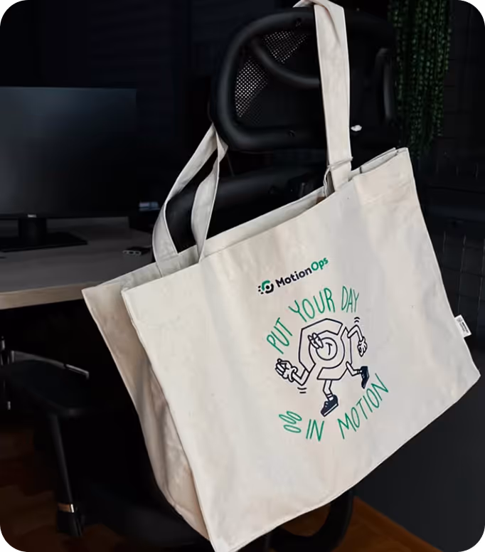 Open menu with a green page listing vitamin juices and prices in Serbian, next to a cartoon black fox wearing red boots holding a glass, on a wooden table with a person's hand nearby.