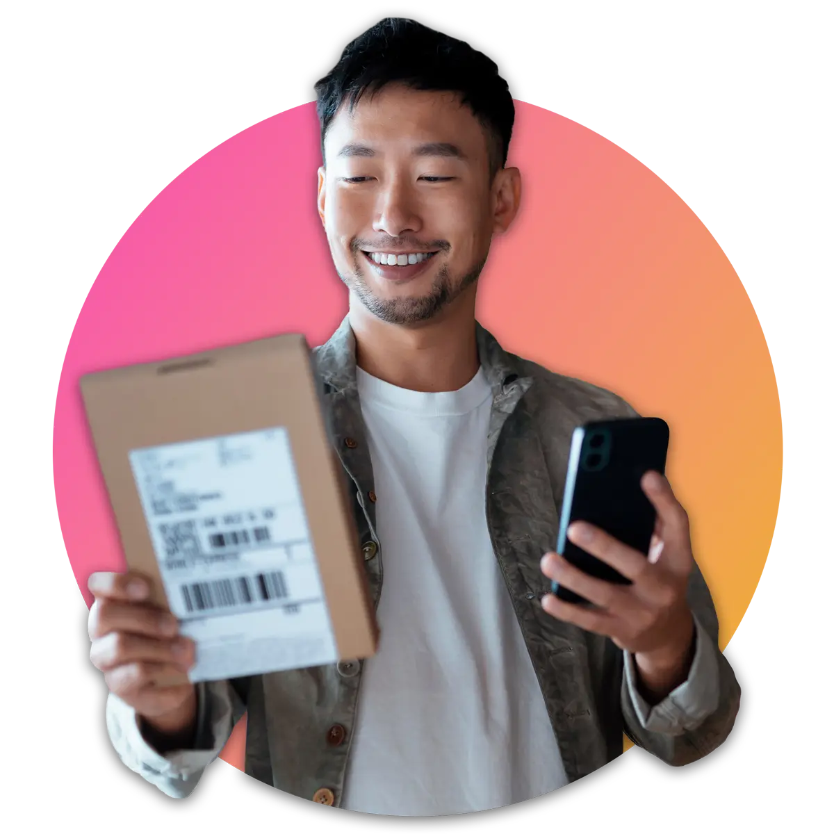 Man holding a package and cell phone smiling
