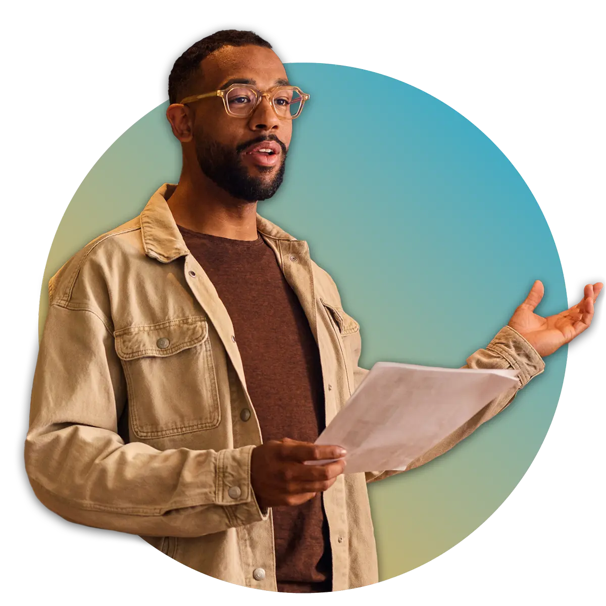 man holding papers and motioning with hands while speaking