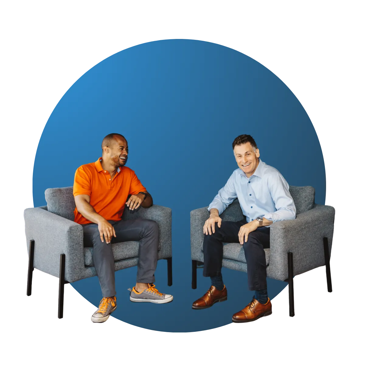 two men sitting in modern-style gray chairs