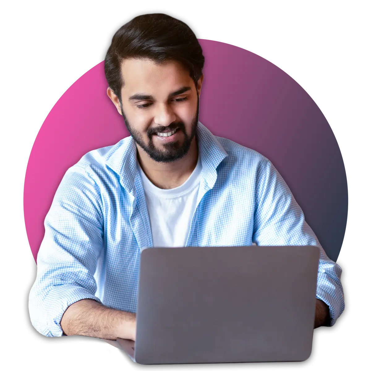 Portrait of a smiling man sitting at a desk with a laptop