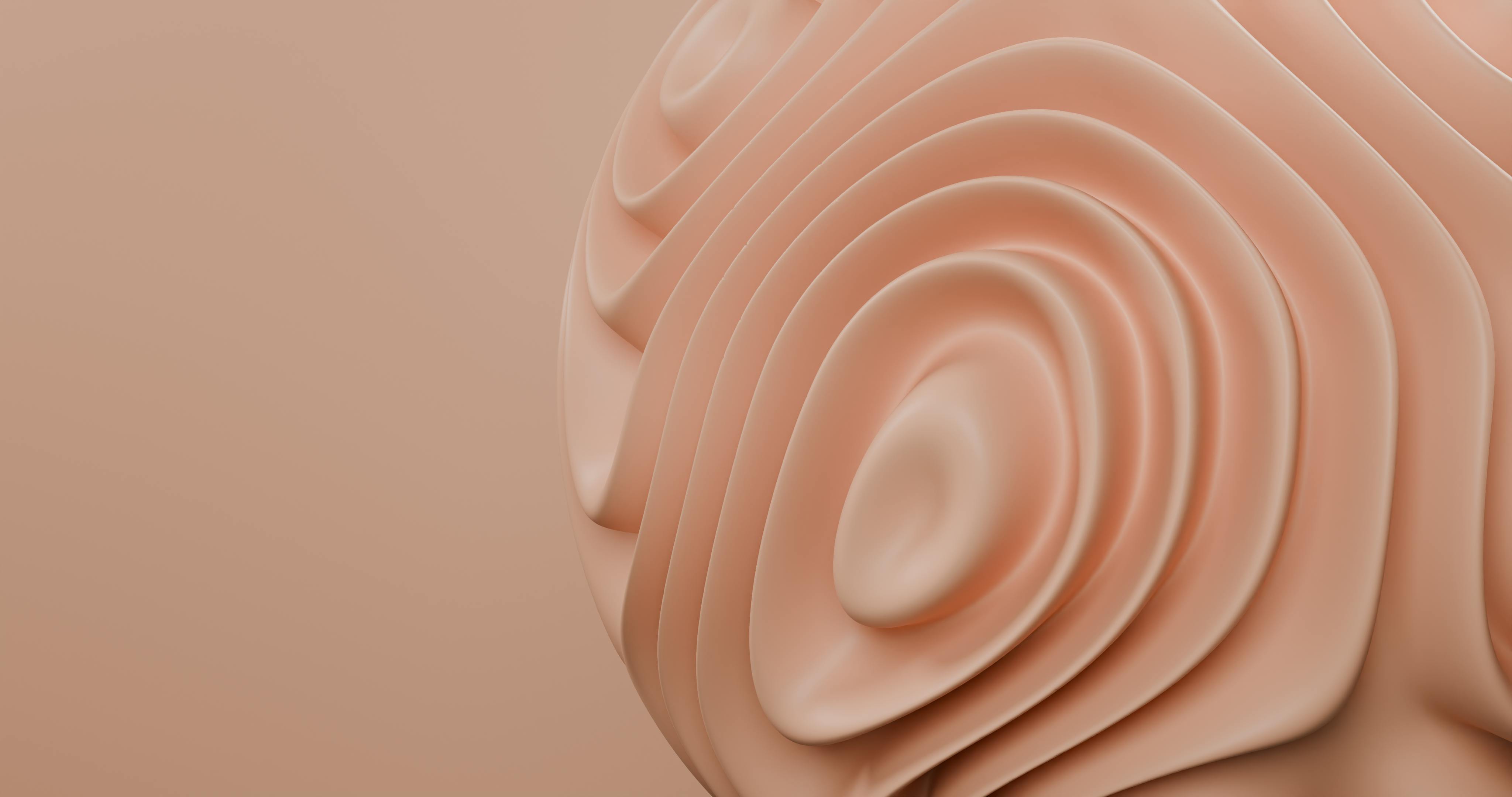 Close-up of a beige abstract 3D shape with smooth, rounded layers and concentric ridges.