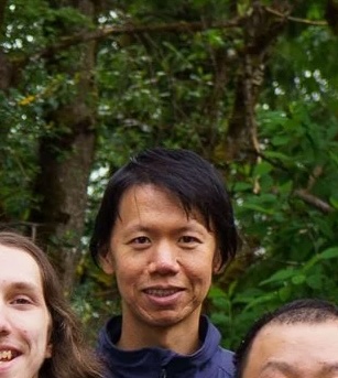 Bo, warehouse lead at ReuseTechBC, standing with is colleagues