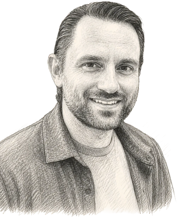 Pencil sketch portrait of a smiling man with short hair and beard wearing a shirt over a t-shirt.