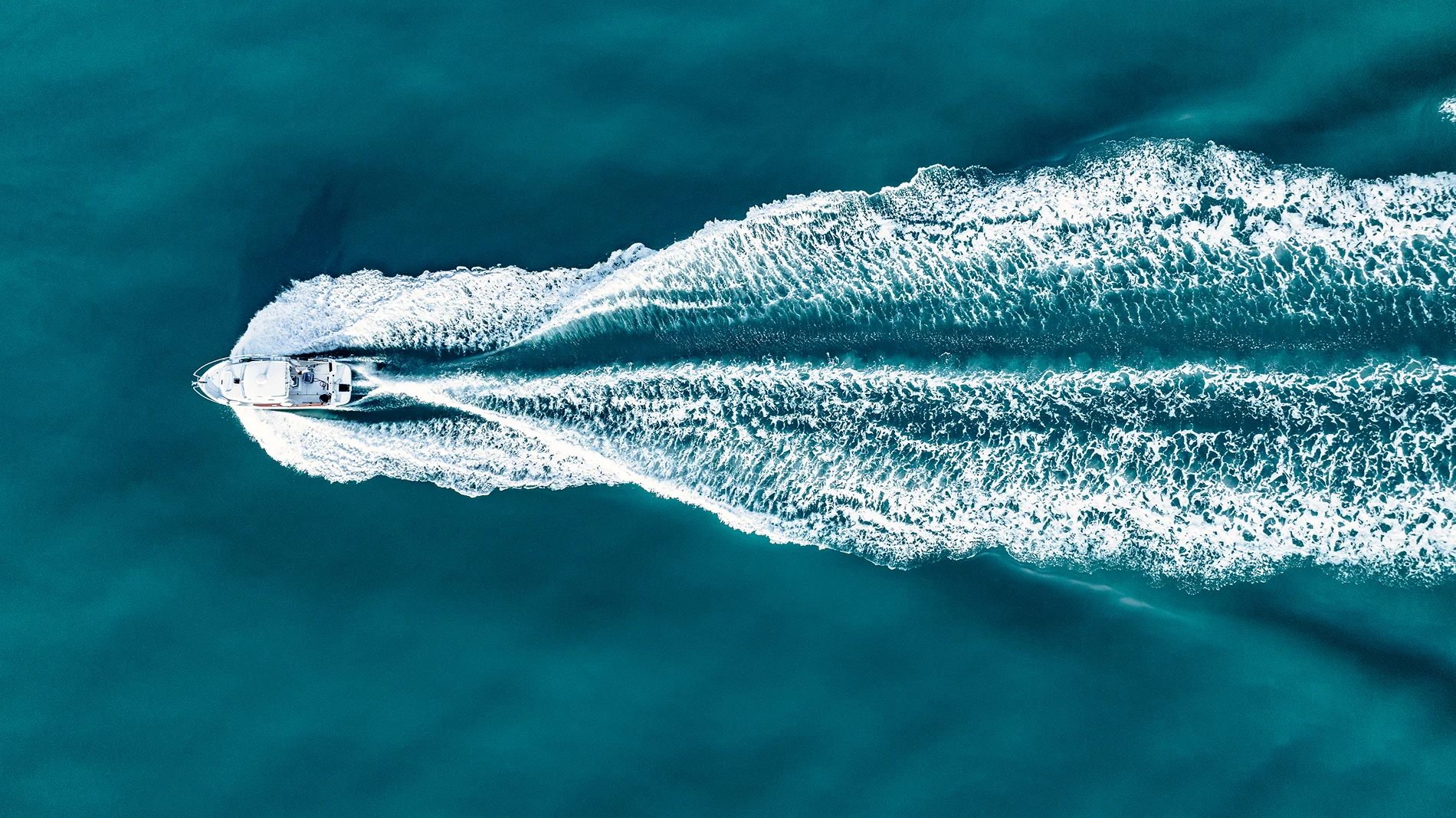 Boat going through water.