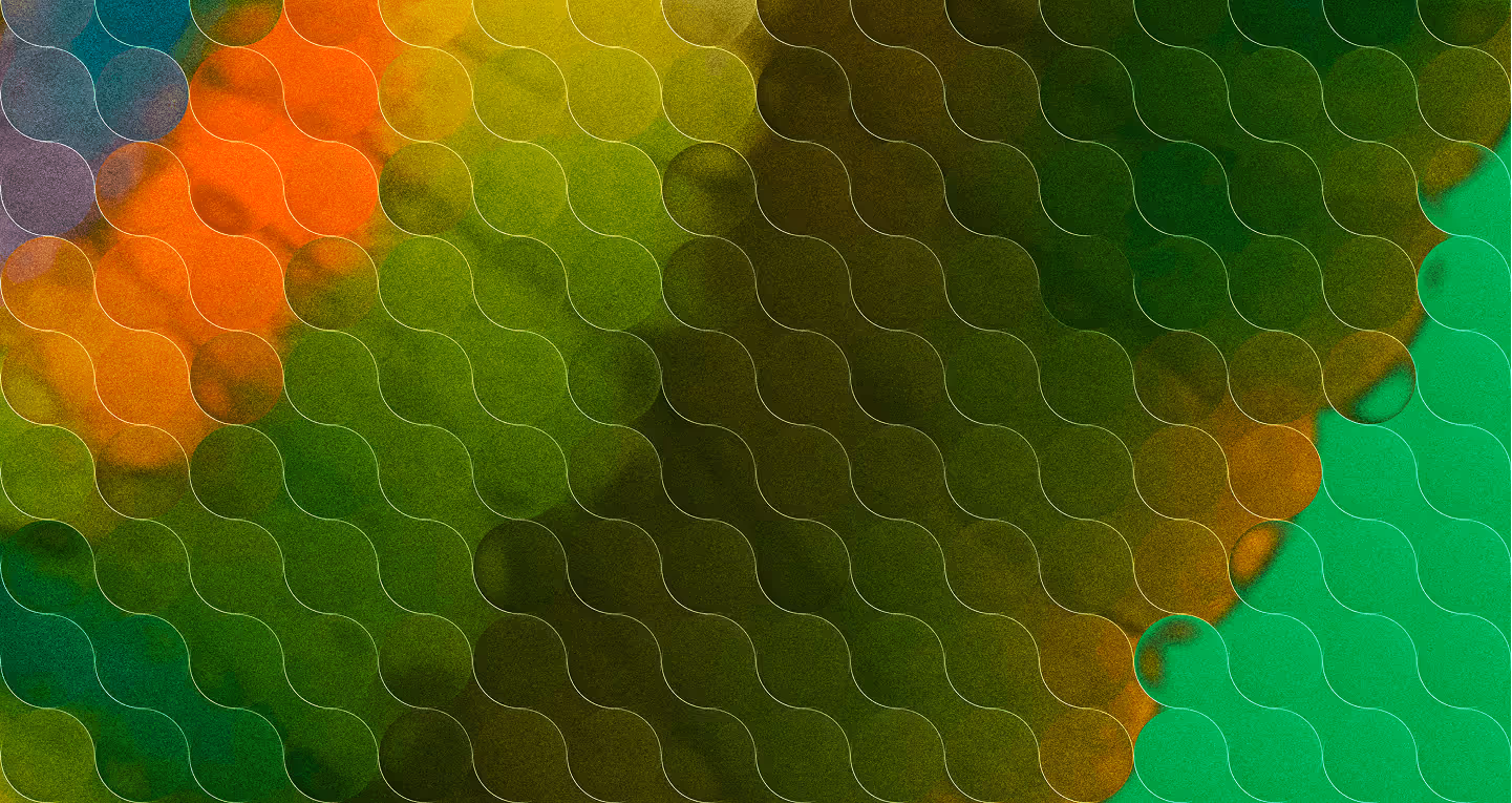 Abstracted bird wing with green, orange, teal shapes and glass orb overlay.