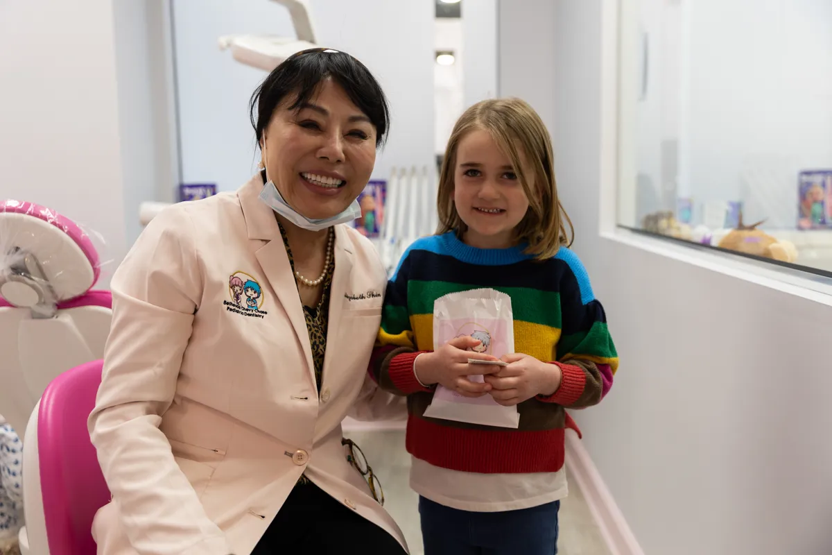 Dr. Andie Shin and kid patient -  Bethesda Chevy Chase Pediatric Dentistry - Pediatric Dentist in Bethesda MD
