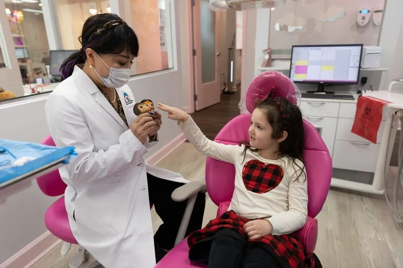 Dr. Andie and kid patient -  Bethesda Chevy Chase Pediatric Dentistry - Pediatric Dentist in Bethesda MD
