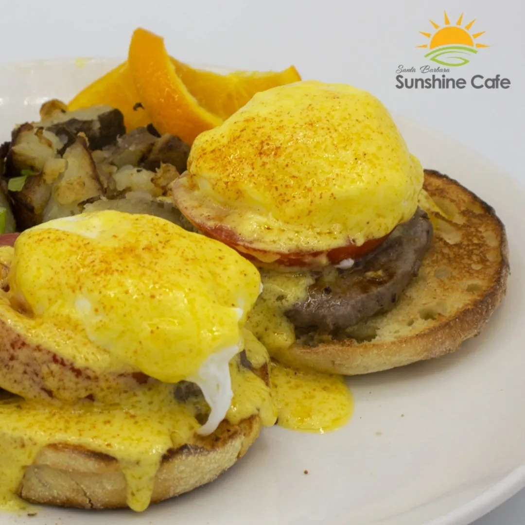 Toasted English muffin, topped with Canadian bacon and beef, a poached egg, and hollandaise sauce. 