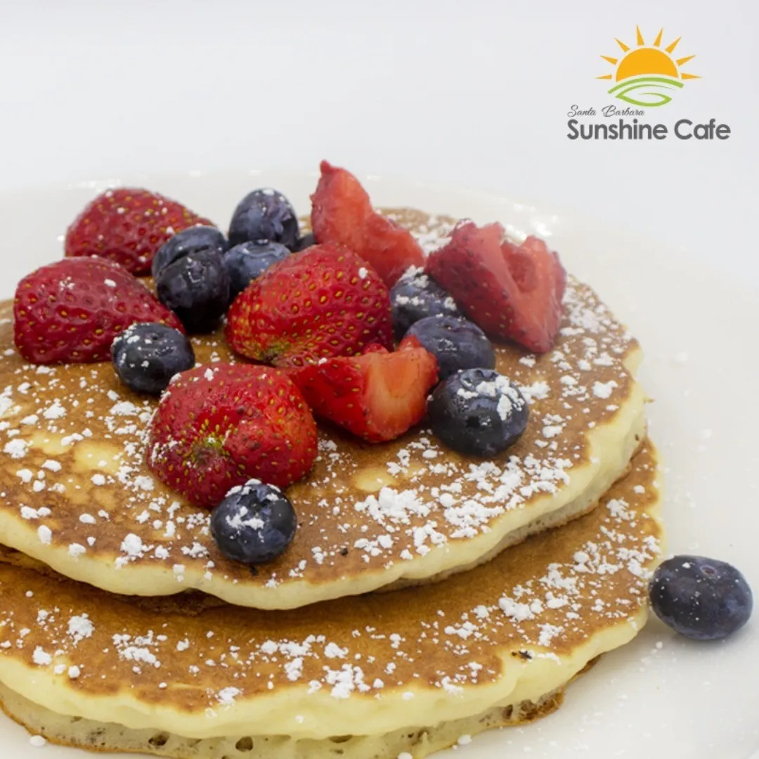 Belguian hotcakes with strawberries and blueberries