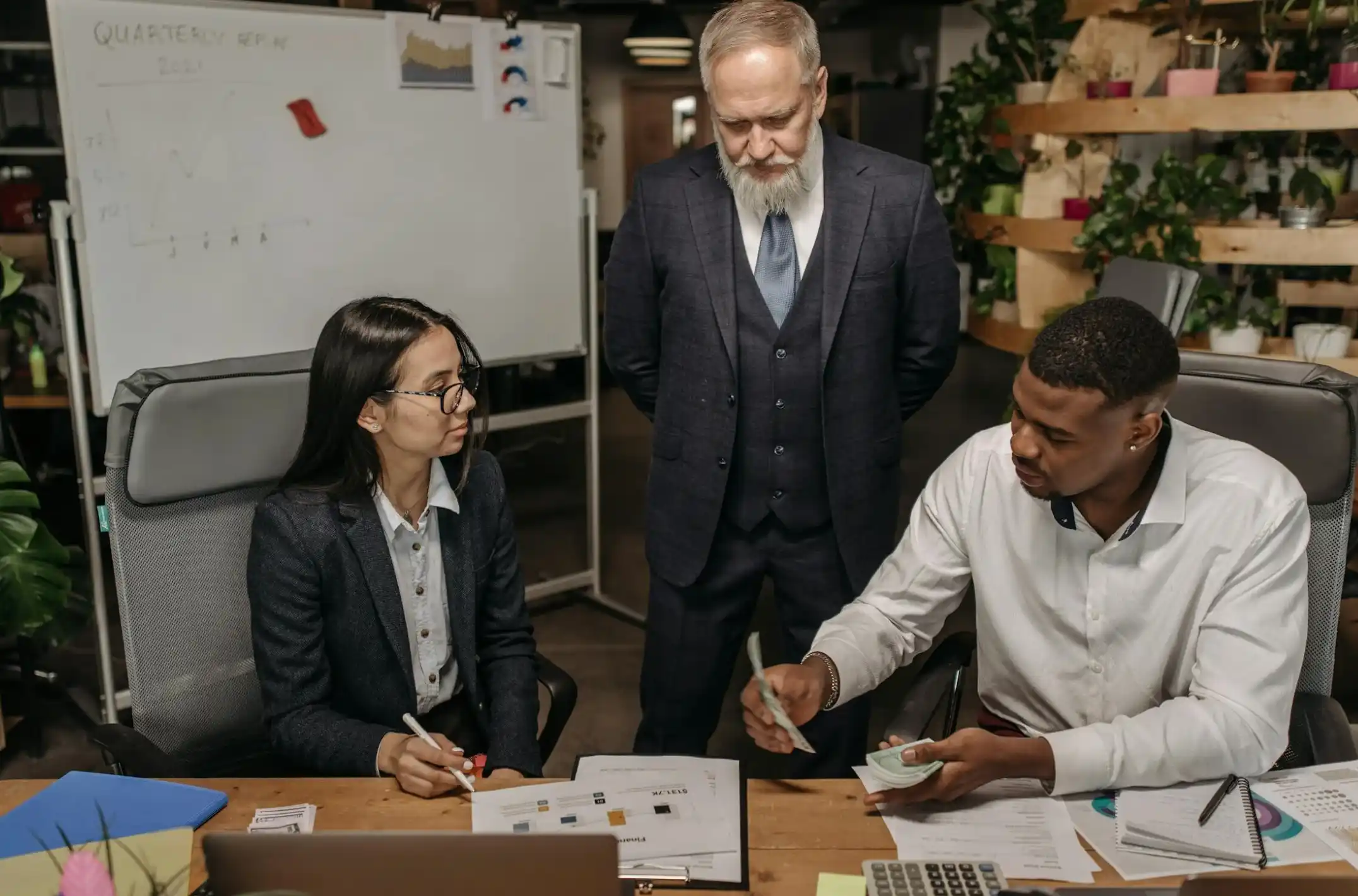 team organizing cash