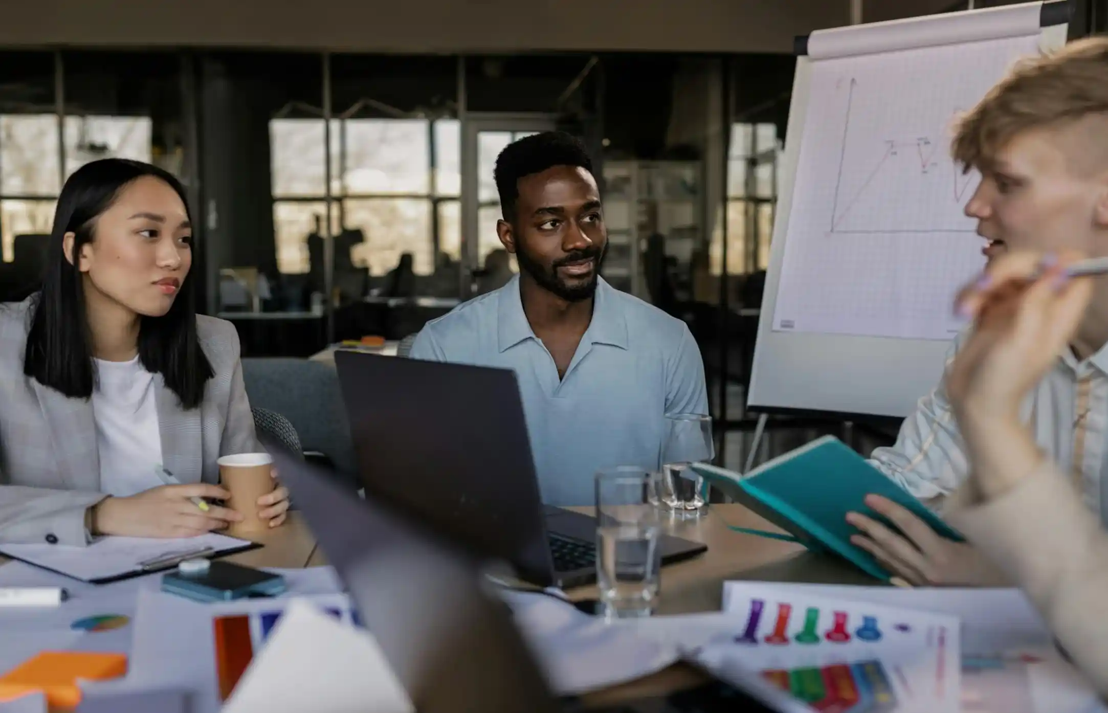People having a meeting in office