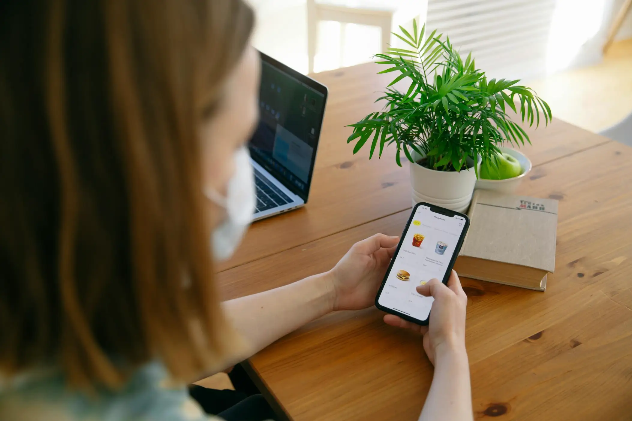 Woman with Face Mask Using Cellphone