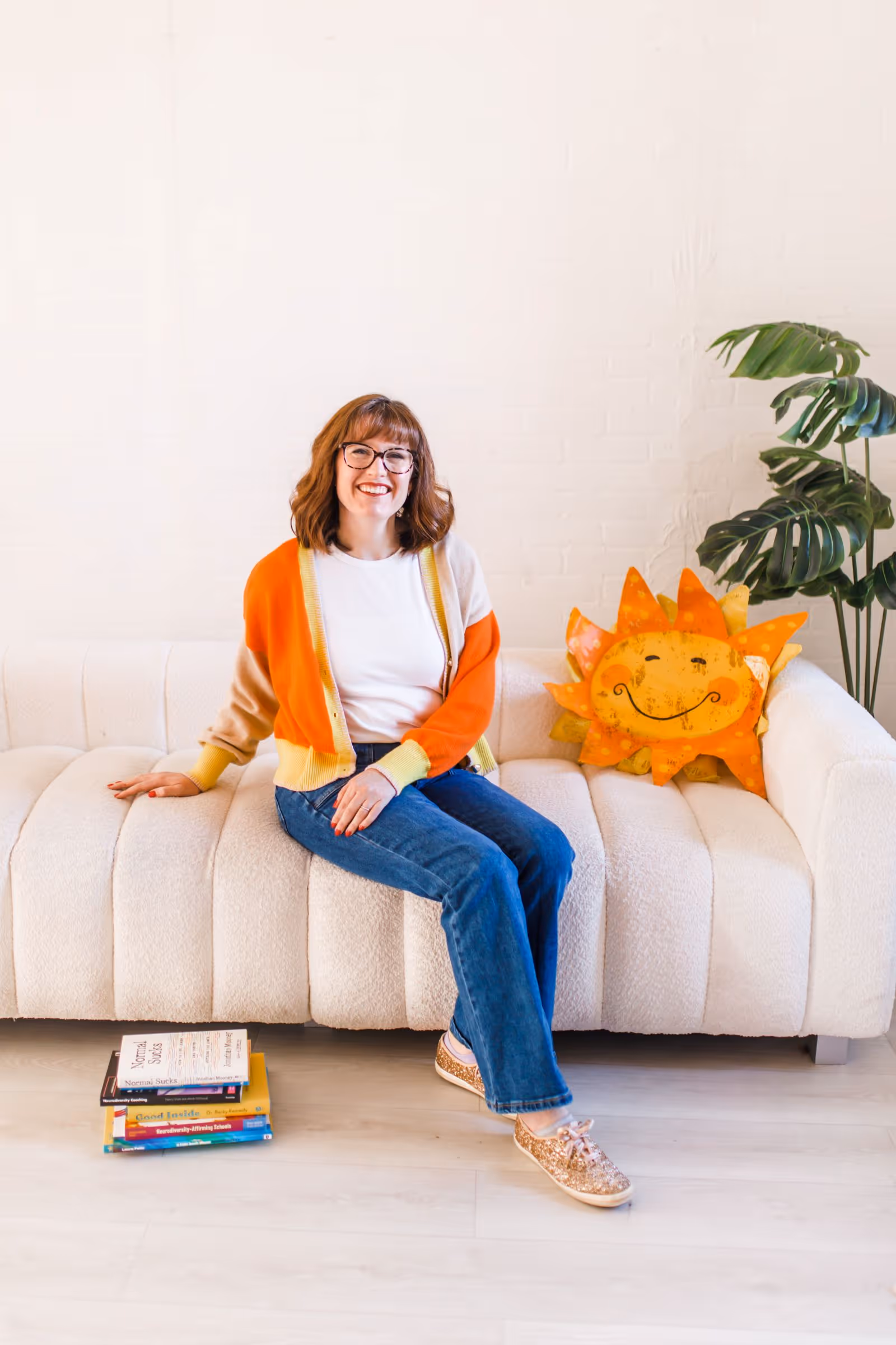 Amy Merenda, smiling in a safe, supportive setting for individual counseling sessions.