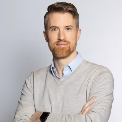 A photograph of Dr. Ilya Feige