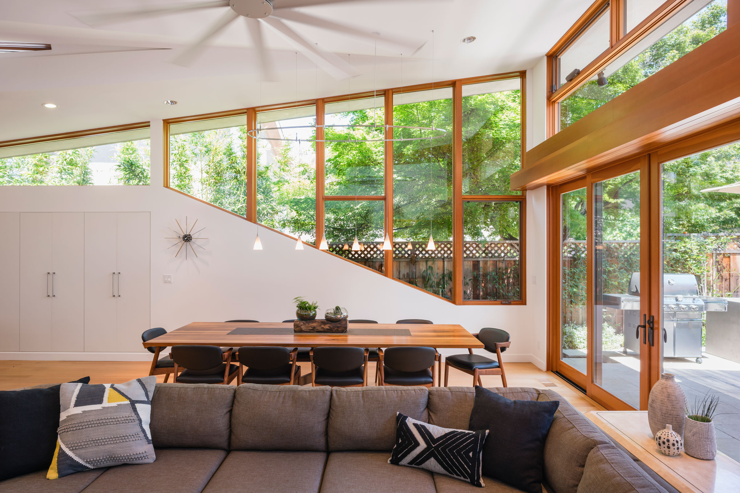 Dining room with angled windows that complement the roof slopes