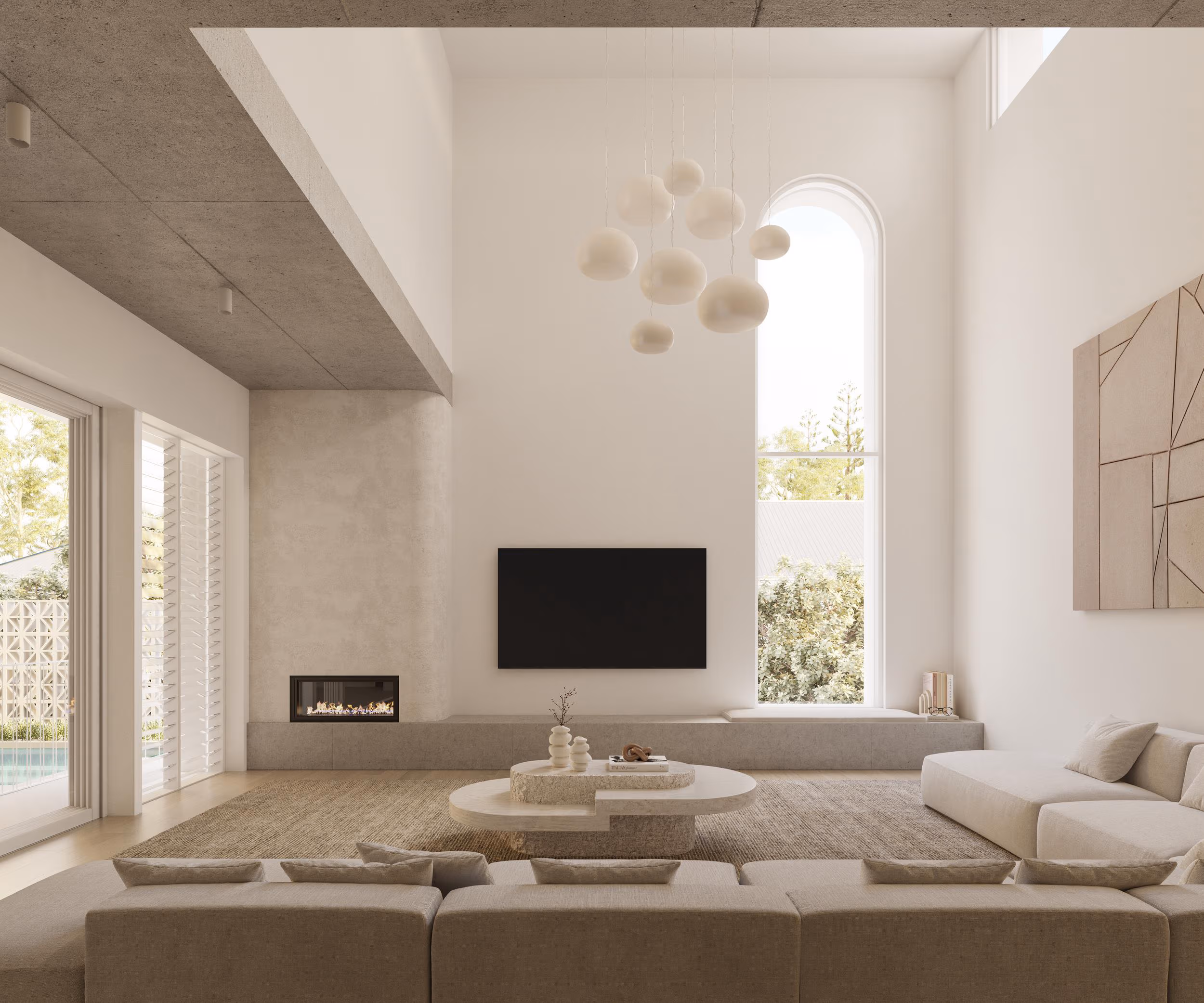 Modern living room with beige sectional sofas, a round coffee table, a wall-mounted TV above a built-in fireplace, a tall arched window, and minimalist pendant lights.