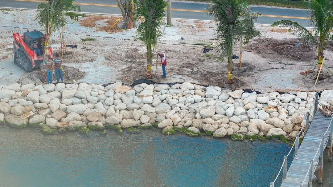 An image taken from the dji mavic 3 - you can see High Surf Corp Emplyees finishing another Coquina Rock Revetment Seawall
