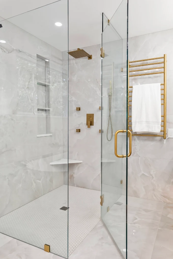 Fully waterproofed open wet room shower conversion featuring curbless tile flooring in Bothell, WA