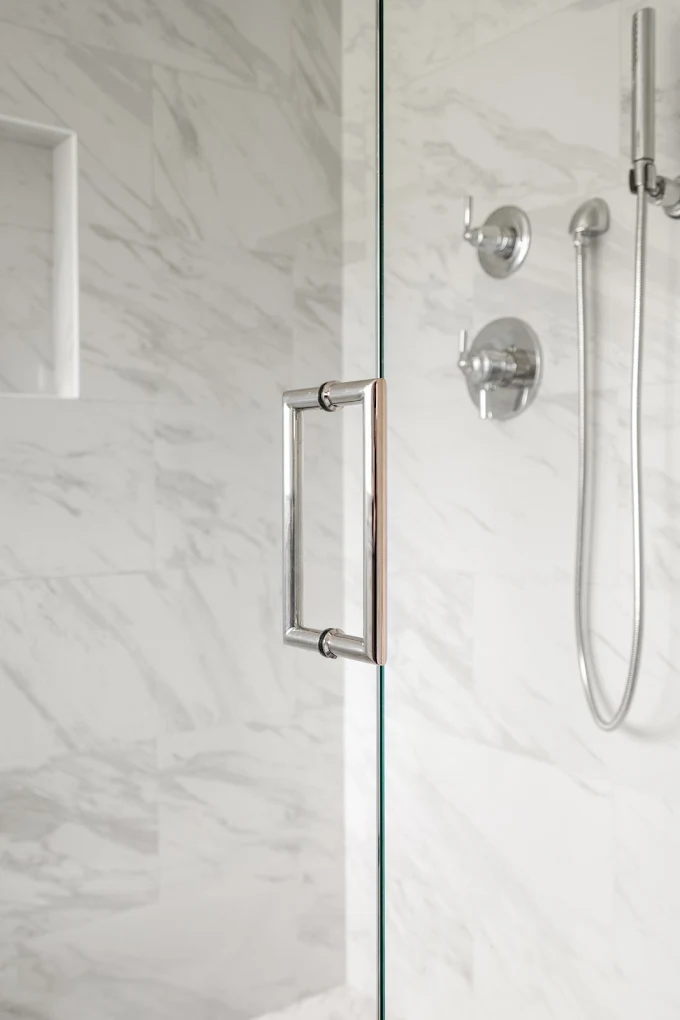 Clean modern walk-in shower with complete fixtures in a Bothell bathroom