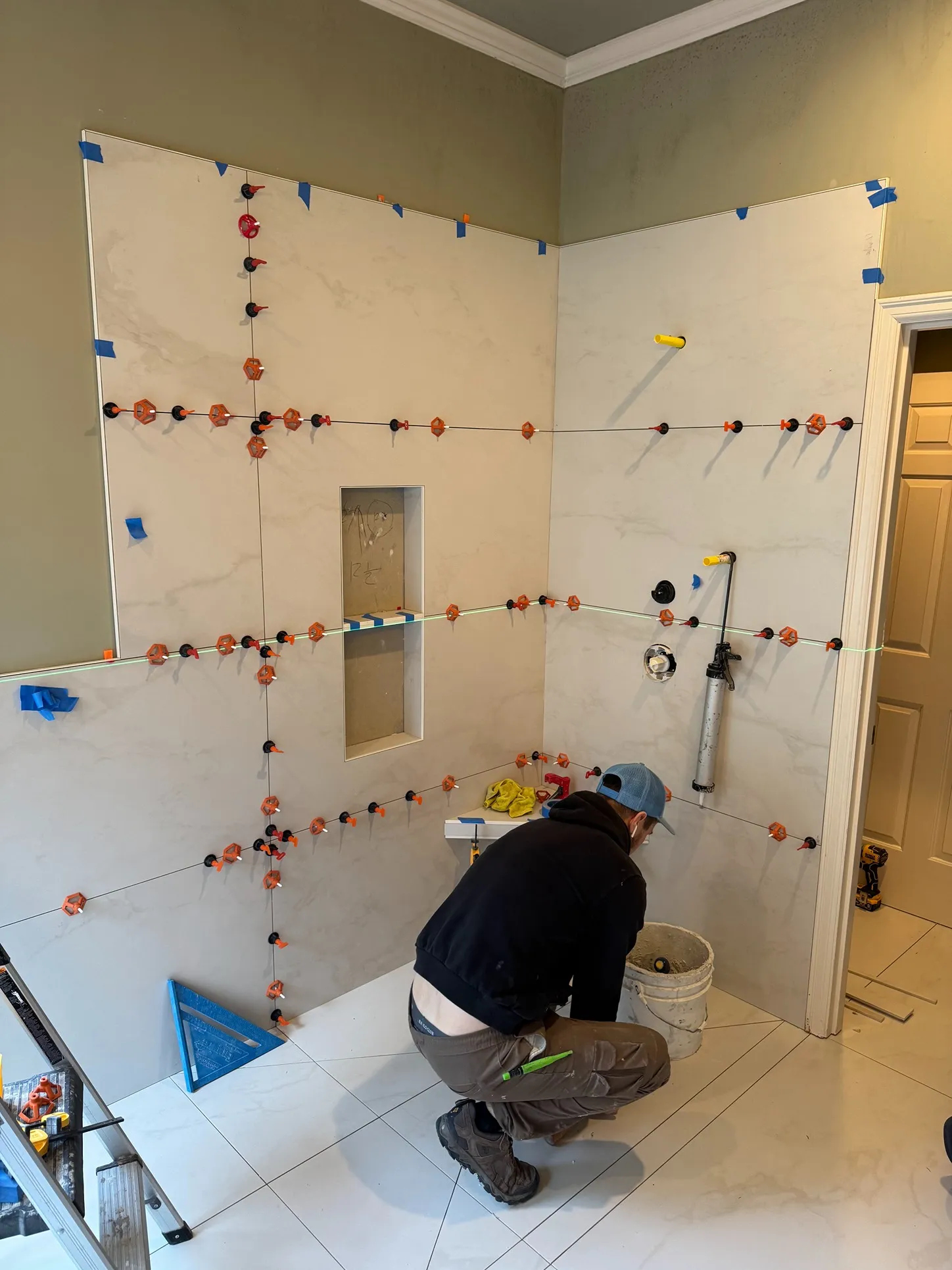 CraftHaus contractor replacing large format tiles of a Bothell bathroom
