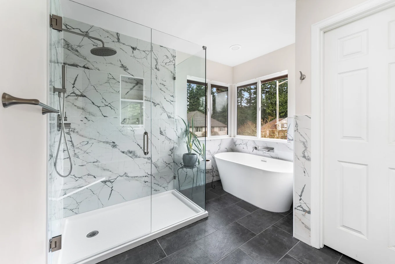 Walk-in shower with acrylic pan and custom wall tile in Bothell
