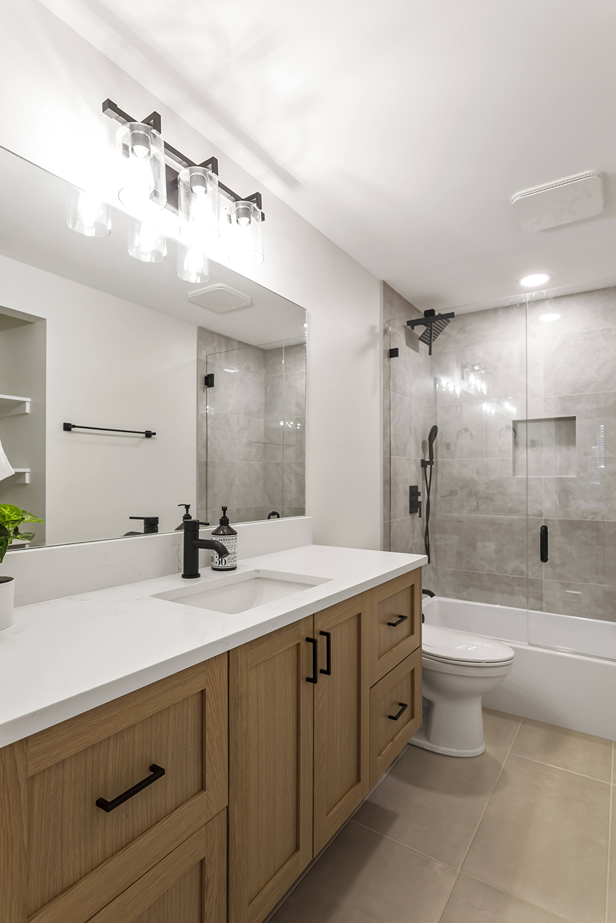 Bathroom drawers and cabinets newly refaced by CraftHaus in Bothell