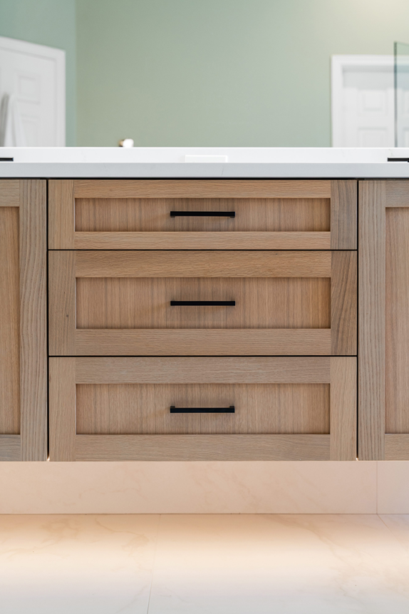Detail of full-extension drawer glides in a custom vanity in Bothell
