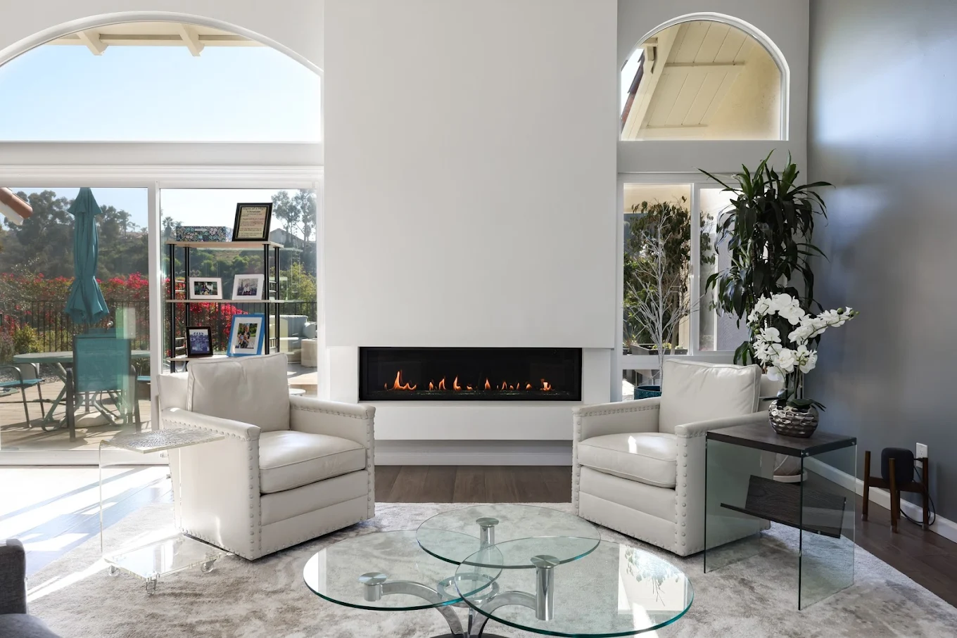 Renovated living room showcasing new flooring and updated design