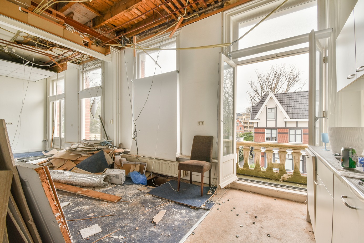 Full gut renovation process showing demolition and rebuild stages