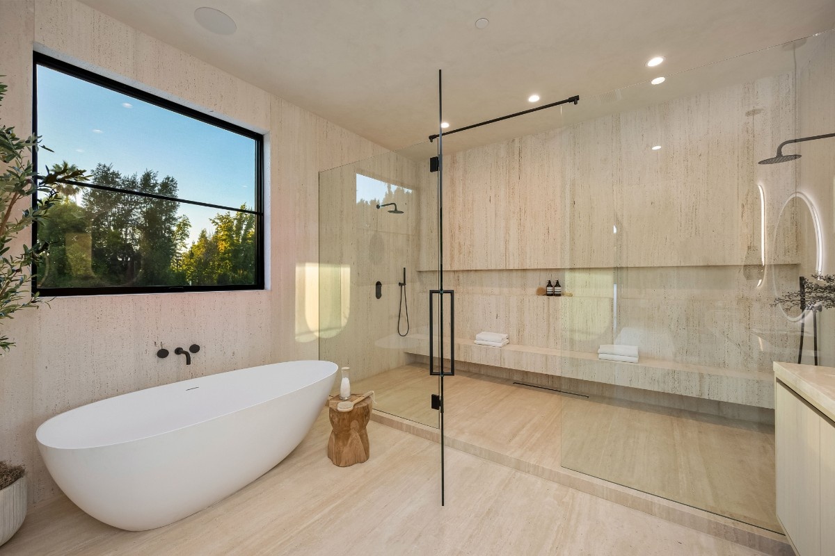 Modern walk-in shower next to a bathtub for resale value comparison