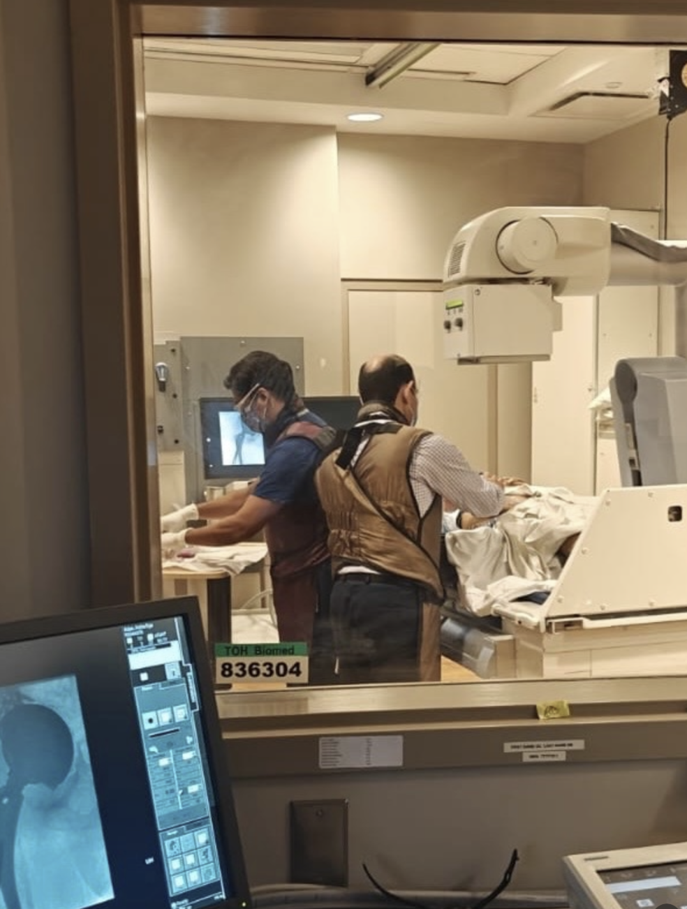 Photo of Dr. Hesham Abdelbary in the field, performing clinical research on a Canadian Patient, with prosthetic joint infection.