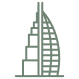 Simplified icon of a tall, modern skyscraper resembling the Burj Khalifa.